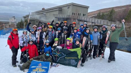 Group photo of the cadets and volunteers on the slopes of the Cairngorms